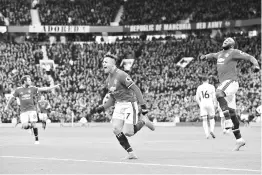  ??  ?? Manchester United’s Chilean striker Alexis Sanchez celebrates scoring the team’s second goal during the English Premier League football match between Manchester United and Swansea at OldTraffor­d in Manchester, north west England, on March 31, 2018. -...