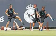  ?? Reuters ?? Real Madrid’s Gareth Bale (left) attends a team training session in Los Angeles.