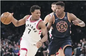  ?? MARY ALTAFFER/THE ASSOCIATED PRESS ?? Toronto Raptors guard Kyle Lowry drives to the basket against New York Knicks guard Frank Ntilikina during the first half in New York on Sunday. The Raptors won 132-106.