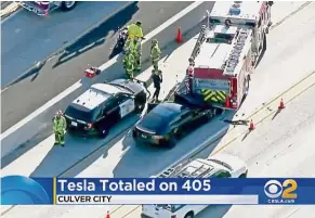  ?? — AP ?? Highway wreck: A screengrab from a KCBS-TV video showing the damaged Tesla Model S car after the accident in Culver City.