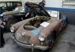  ??  ?? Left: 1953 XK120 had a later grille. Above: MGA looked like a viable winter project