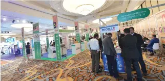  ?? AFP ?? EXHIBITORS and visitors attend the Halal Expo dedicated to the growing halal food industry on Sept. 18, in the United Arab Emirate of Dubai.