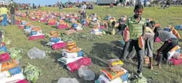  ?? Picture: GARY HORLOR ?? SOMETHING TO CHEW ON: Opposition political parties have criticised the ANC for trying to secure votes in Mbashe, Eastern Cape, by handing out food parcels