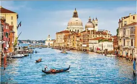  ??  ?? Gorgeous view of the famous Canal Grande and Basilica in Venice, Italy.