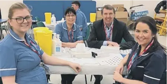  ??  ?? Trust chief executive Ken Bremner with, from left to right, staff nurses Jessica Sharp and Shelley Lishman and clinical team manager Linsay Compton.