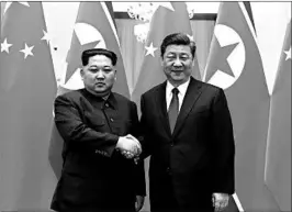  ?? JU PENG/XINHUA NEWS AGENCY ?? North Korean leader Kim Jong Un, left, and Chinese President Xi Jinping met this week in advance of Kim’s planned meetings with South Korean and U.S. leaders this spring.