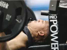  ?? AJ MAST/AP ?? Gipson, who put on about 60 pounds during his five years at Tulsa, displays his strength on the bench press at the NFL combine.