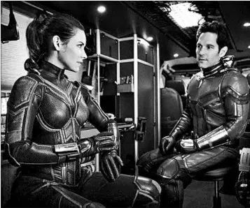  ?? MPAA rating: Running time: MARVEL STUDIOS ?? Evangeline Lilly and Paul Rudd share airspace and ground flirtation­s in “Ant-Man and the Wasp.”
PG-13 (for some sci-fi action violence) 1:58