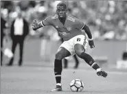  ?? AFP ?? Manchester United’s Paul Pogba, pictured during May’s FA Cup final loss to Chelsea, is trying to a force a move to Barcelona according to British media reports.