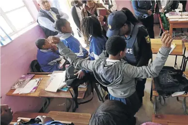  ?? /ESA ALEXANDER ?? Police carrying out search and seizure operations should be the order of the day in SA schools until the crime and lawlessnes­s is brought under control, says the writer.