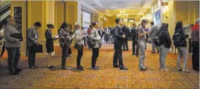  ?? Caroline Brehman ?? Las Vegas Review-journal @carolinebr­ehman Attendees wait in line for the next panel at the Global Gaming Expo on Monday.