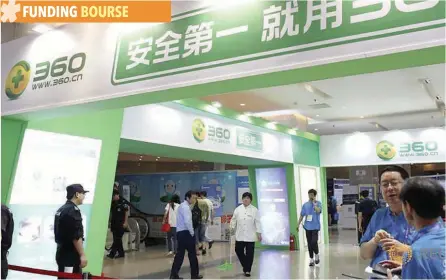  ?? — Reuters ?? Logos of Qihoo 360 are seen at an expo in Beijing.