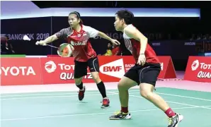  ?? WIDYA AMELIA/PP PBSI FOR JAWA POS ?? ANDALAN: Greysia Polii (kiri) dan Apriyani Rahayu saat bertanding di Piala Uber 2018 di Bangkok (23/5).