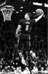  ??  ?? Zach LaVine of the Minnesota Timberwolv­es dunks in the Verizon Slam Dunk Contest during NBA All-Star Weekend 2016 at Air Canada Centre on February 13, 2016 in Toronto, Canada. - AFP photo