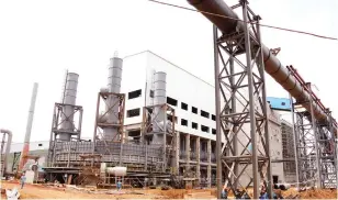  ?? ?? The Dinson Iron and Steel plant which is nearing completion in Manhize