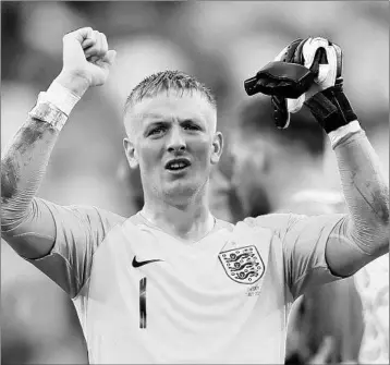  ?? CLIVE ROSE/GETTY ?? Goalkeeper Jordan Pickford celebrates after England defeats Sweden in a World Cup quarterfin­al in Samara, Russia. France vs. Belgium 2 p.m. Tuesday Croatia vs. England 2 p.m. Wednesday