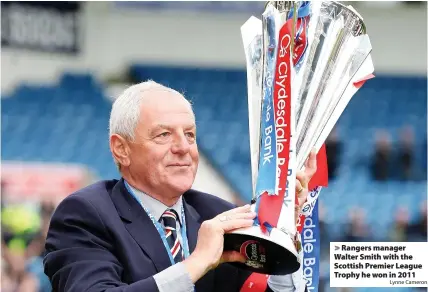  ?? Lynne Cameron ?? Rangers manager Walter Smith with the Scottish Premier League Trophy he won in 2011