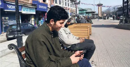  ?? ?? ON INTERNET SHUTDOWNS, a Parliament­ary Standing Committee report notes that India is number one globally, and the country has lost billions of dollars annually due to such shutdowns. People using cellphones in Srinagar, a file picture.