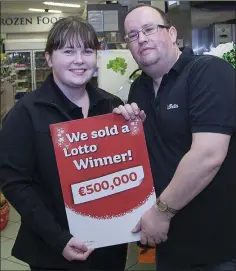  ??  ?? RIGHT: Staff members Aine Byrne and Damien Kenny celebrate selling the €500,000-winning Euromillio­ns ticket in O’Reilly’s Londis store in Hacketstow­n last Friday.