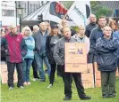  ??  ?? Dunedin workers rallied on Saturday to protest the closure of the chocolate factory.