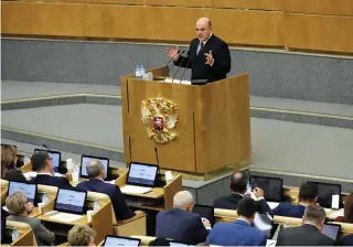  ?? DR ?? Deputados da Duma (Câmara Baixa) deram voto de confiança a Mikhail Mishutin