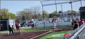  ?? David Jacobs/sdg Newspapers ?? With coach Sami Martin near the mound, the Shelby Lady Whippets warm up prior to Thursday’s game.