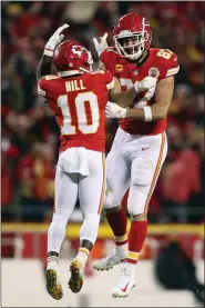  ?? TRAVIS HEYING - THE ASSOCIATED PRESS ?? Kansas City Chiefs tight end Travis Kelce (87) celebrates with teammate Tyreek Hill (10) during the second half of an NFL wild-card playoff football game against the Pittsburgh Steelers, Sunday, Jan. 16, 2022, in Kansas City, Mo.
