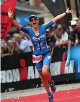  ?? ?? Lucy Gossage, seen below winning Ironman UK in 2018, was known for her exuberant finish-line celebratio­ns! GETTY IMAGES