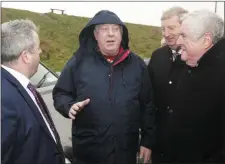  ??  ?? Arklow man Pat Fortune making his point to Minister Moran, Deputy Pat Casey and Cllr Pat Fitzgerald at Arklow’s North Beach.