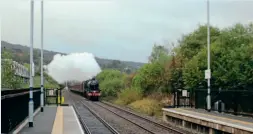  ?? ?? LMS 5XP No. 45699 Galatea, running as No. 45627 Sierra Leone, approaches Hathersage station on October 24 with the Railway Touring Company’s ‘The Tin Bath’ on October 24. JAMES SHUTTLEWOR­TH