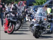  ?? DAVID MEKEEL — MEDIANEWS GROUP ?? Motorcycli­sts line up for the start of the annual Tyler’s Ride fundraiser in honor of Tyler Dierolf, who was killed in a 2015 crash on Route 100.