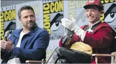  ?? RICHARD SHOTWELL/THE ASSOCIATED PRESS ?? Ben Affleck, left, seen with Ezra Miller at Comic-Con, says he will play Batman in an upcoming film.