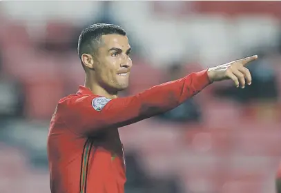  ?? Picture: Reuters ?? NEARING THE RECORD. Portugal’s Cristiano Ronaldo celebrates after scoring their sixth goal during an internatio­nal friendly against Andorra at Estadio da Luz in Lisbon on Wednesday.