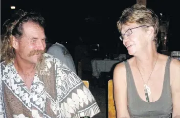  ?? AUSAGE FAUSIA/SAMOANEWS VIA AP; HANDOUT ?? Left: Dean Fletcher, left, is escorted by a police officer after his initial appearance in the District Court of American Samoa in Pago Pago on Oct. 4, 2016. Fletcher escaped from custody twice. Right: Dean Fletcher and Patricia Kearney, circa 2013.