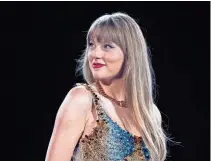  ?? SUZANNE CORDEIRO/AFP VIA GETTY IMAGES ?? “Taylor Swift: The Eras Tour (Taylor’s Version)” will offer three additional songs not included in the first version of the film.