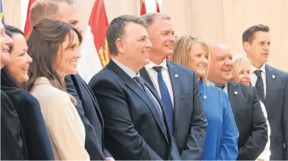  ?? STU NEATBY ?? P.E.I. Premier Dennis King (fifth from left) announced members of his new cabinet on April 14. From left are Cory Deagle, Ernie Hudson, Jill Burridge, Natalie Jameson, Bloyce Thompson, King, Mark McLane, Jenn Redmond, Gilles Arsenault, Barb Ramsay and Rob Lantz.