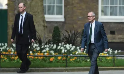  ??  ?? England’s chief medical officer, Prof Chris Whitty (left) and the UK’s chief scientific officer, Sir Patrick Vallance arrive at 10 Downing Street. Photograph: Peter Summers/Getty Images