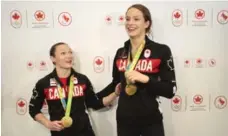  ??  ?? Gymnast Rosie MacLennan and swimmer Penny Oleksiak flash their gold.