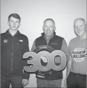  ?? Mona Weatherly ?? Acknowledg­ed for 300-plus bushel per acre harvest are, from left, Adam Knapp and Jay Knapp of Knapp Cattle Co. and Bill Giffin of B&D Giffen.