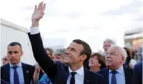  ?? (Stephane Mahe/Reuters) ?? FRENCH PRESIDENT Emmanuel Macron waves as he attends a christenin­g ceremony for the MSC Meraviglia cruise ship in Saint-Nazaire yesterday.
