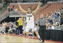  ?? ASSOCIATED PRESS/JAE HONG ?? No matter how much of an underdog they might be, you have to love a team nicknamed the Anteaters. That would be the University of California-Irvine, whose Alex Young is shown celebratin­g his team's 67-58 win over Hawaii in the Big West Conference men's...