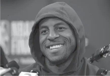  ?? AP Photo ?? SIT OUT. Golden State Warriors’ Andre Iguodala smiles as he answers questions after an NBA basketball practice in Oakland, Calif. The Warriors face the Cleveland Cavaliers in Game 1 of the NBA Finals today (PH time) in Oakland.