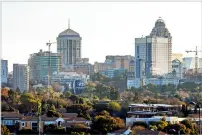  ?? Bloomberg ?? Buildings at the Central Business District form the city skyline of Johannesbu­rg, South Africa. —