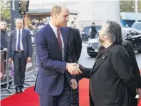  ?? PHOTO: GETTY IMAGES ?? Prince William, Duke of Cambridge, shakes hands with Peter Jackson at the world premiere of They Shall Not Grow Old at the 62nd BFI London Film Festival yesterday.