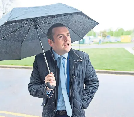  ?? ?? Douglas Ross is determined to remain Scottish Conservati­ves leader despite the loss of more than 60 seats.