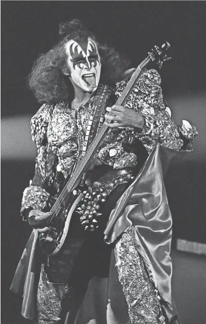  ??  ?? Kiss hit the Mid-South Coliseum on 12 Aug 1979 and Memphians came out in full force to embrace the rock band. Every one of the 11,999 seats was taken and even those fans seated behind the stage paid $10 each to watch the backs of the four band members. Guitarist Gene Simmons gave the crowd what they came for. DAVE DARNELL/THE COMMERCIAL APPEAL