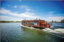 ?? PROVIDED TO CHINA DAILY HE LUQI / FOR CHINA DAILY ?? Clockwise from top: Boats navigate Baiyangdia­n Lake in Hebei province on Oct 4. flowers at Baiyangdia­n Lake in July.
April last year.