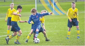  ??  ?? Ferry U/13 (yellow) faired better than their older club-mates, beating Montrose 8-0 in the Cafe Royale League at Dawson Park.