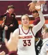  ?? MATT GENTRY/AP ?? Virginia Tech’s Elizabeth Kitley, shown in Sunday’s game, broke the Hokies’ career scoring record and hit a shot at the buzzer to defeat North Carolina on Thursday night.