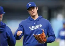  ?? DAVID CRANE — STAFF PHOTOGRAPH­ER ?? Shohei Ohtani works out after his press conference at Dodger Stadium before Monday night's exhibition game against the Angels.